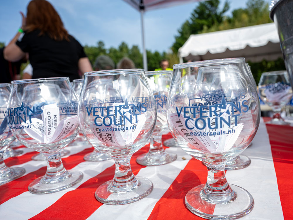 Veterans Count glasses on an American flag decorated table cloth.