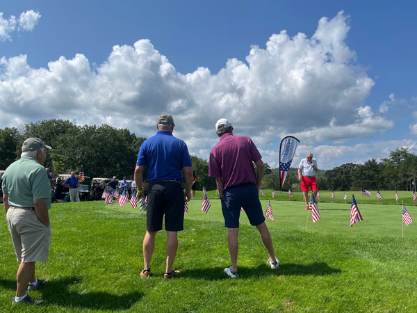 Golfers at the 2023 Lakes Region Golf Tournament.